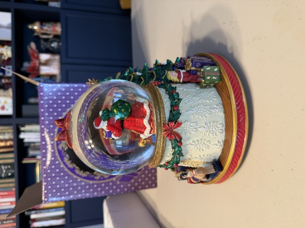 Resplendent Santa Snowglobe